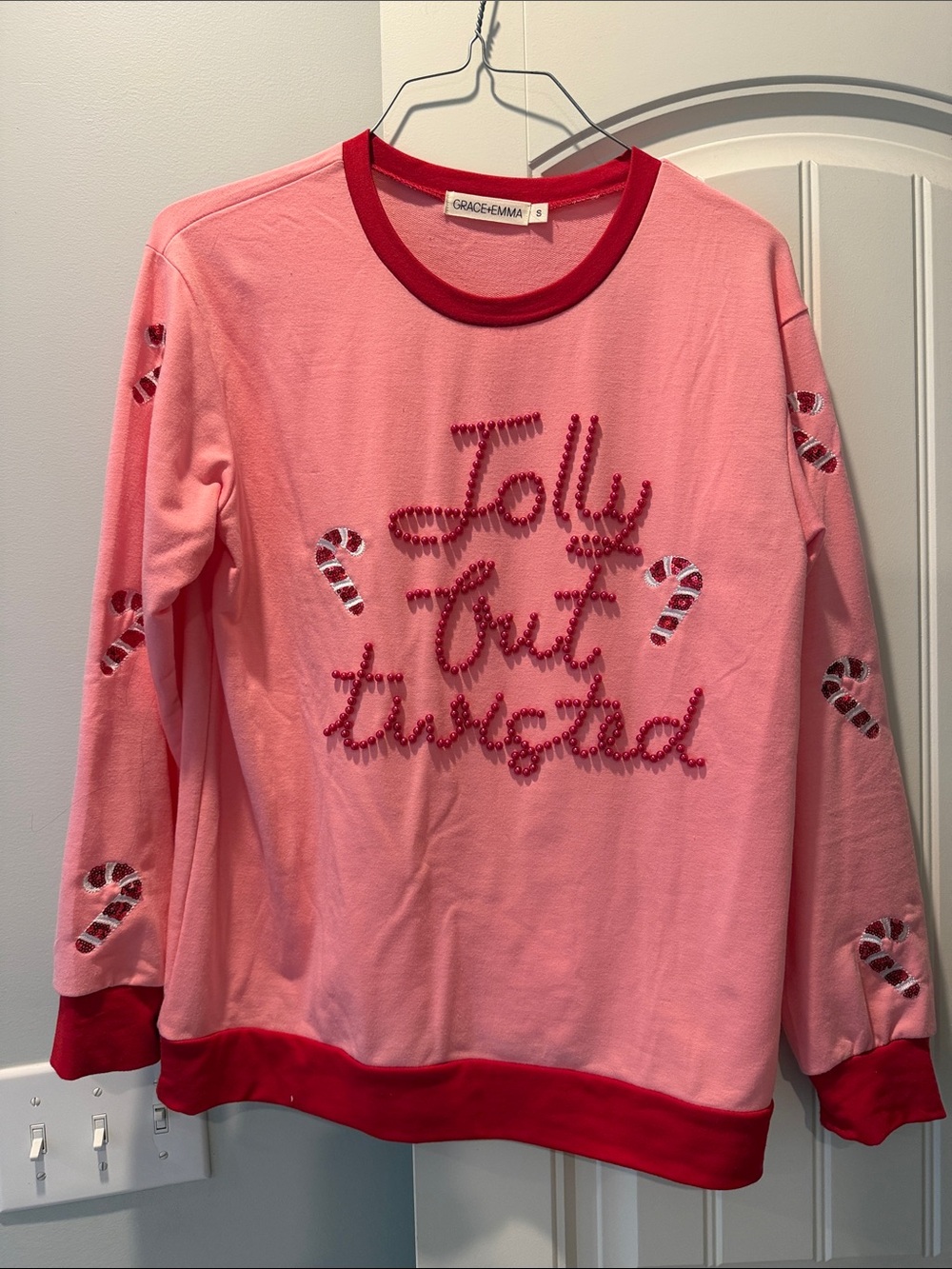 Pink 'Jolly But Twisted” Long-Sleeve Top